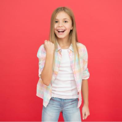 picture of a happy child on a red background