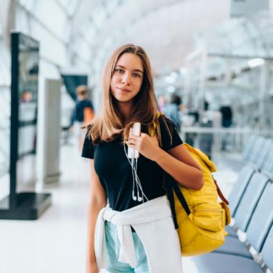 picture of a teenager at an airport