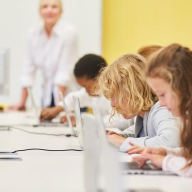 picture of children using computers at school