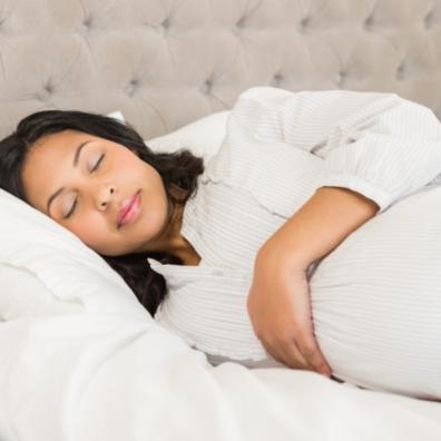 picture of a pregnant woman sleeping
