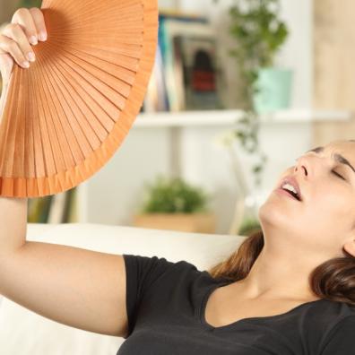 picture of a hot woman fanning herself