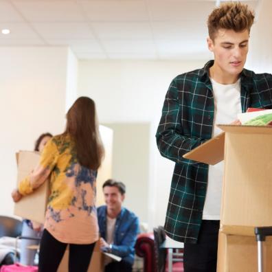 picture of students moving boxes into university halls