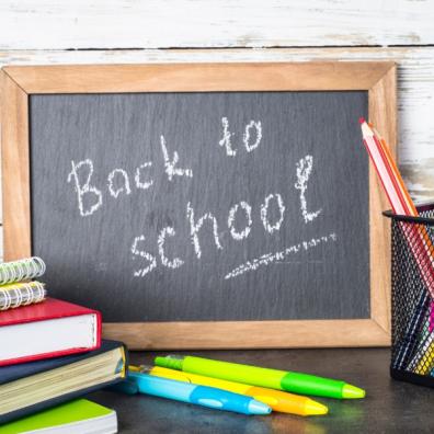 picture of a chalkboard with back to school written on