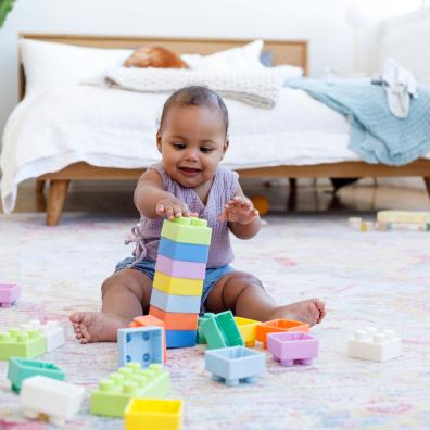 picture of baby playing with blocks