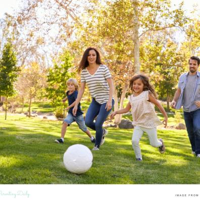 picture of a family building healthy habits exercising together outside