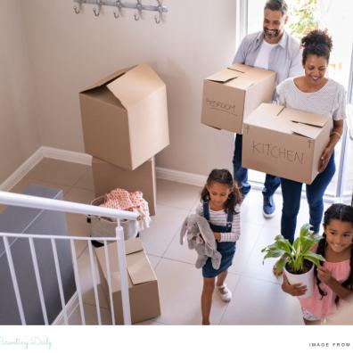 picture of a happy family moving house