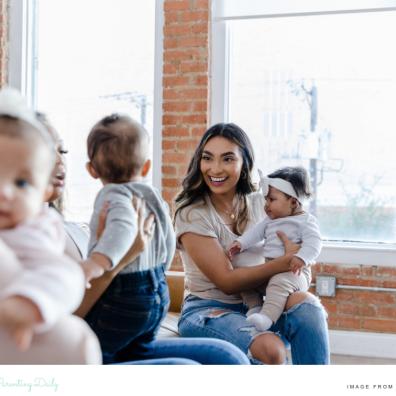 picture of a happy mum and baby interacting at a mother and baby group
