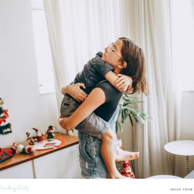 picture of a mum hugging her child helping them to manage their emotions