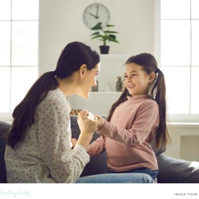 picture of a mum looking at her happy child and letting her child talk