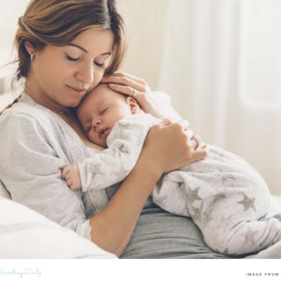 picture of a new mum with her sleeping new baby laying on her chest