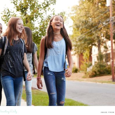 picture of happy teenagers walking down the street thinking about their futures