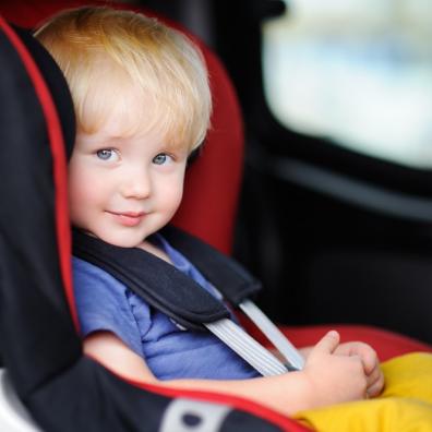 Picture of a cute child in a car seat