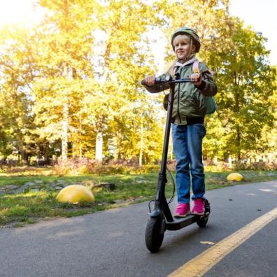 picture of a child on an e scooter