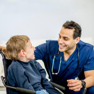 picture of a disabled child with a doctor