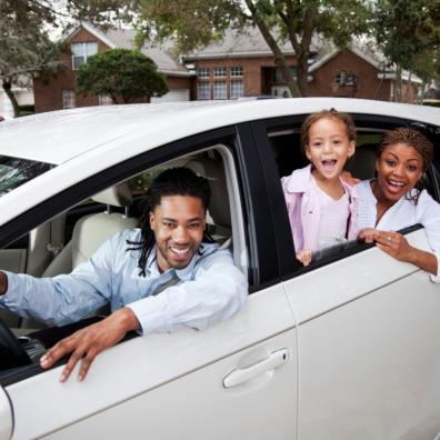 picture of a family in a car