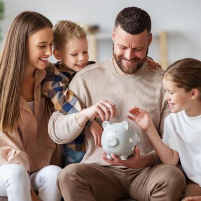picture of a family saving money in a piggy bank