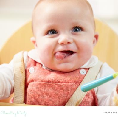 picture of a happy baby weaning