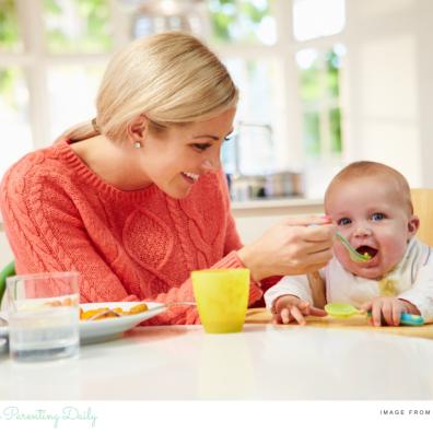 picture of a happy mum weaning her baby