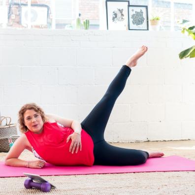 picture of a pregnant woman doing pilates