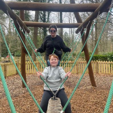 picture of a mum and autistic child in a park