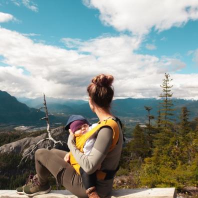 picture of mum and baby looking out over mountains