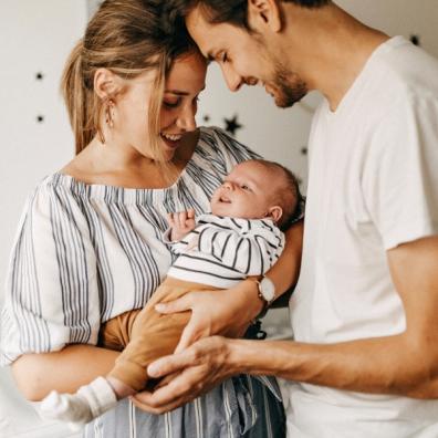 picture of parents holding a baby