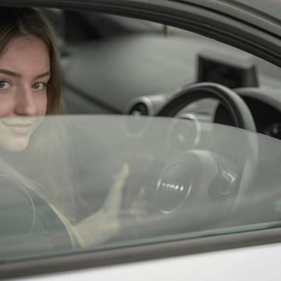 teenager driving a car