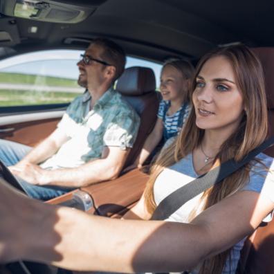 picture of a family in a car