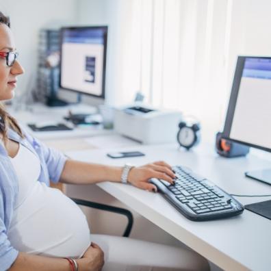 picture of pregnant woman at work