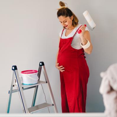 picture of pregnant woman decorating