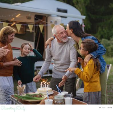 picture of a three generation family enjoying a caravan holiday together
