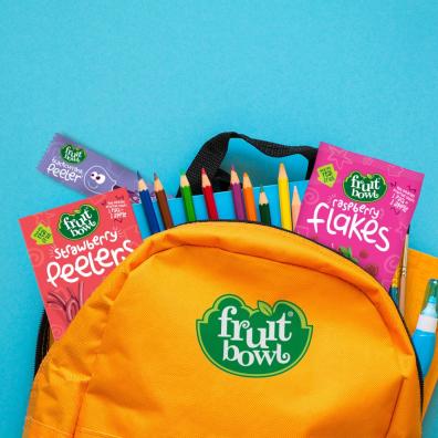 picture of backpack filled with fruit bowl fruity snacks for kids